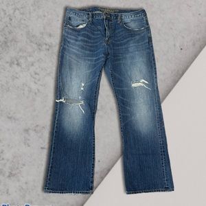 American Eagle deconstructed boot cut jeans